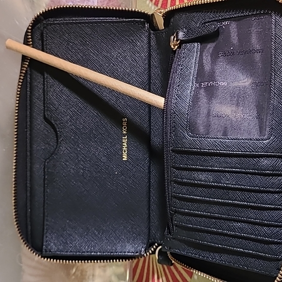 Jet Set Travel Large Pebbled Leather Wristlet - Picture 3 of 3